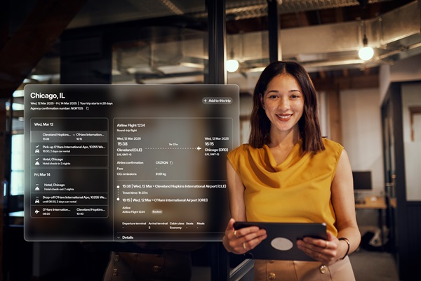 Businesswoman viewing digital flight information display.