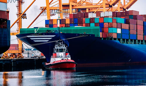 web container ship and tugboat in harbor tacoma wash 2025 04 03 21 10 49 utc.jpg